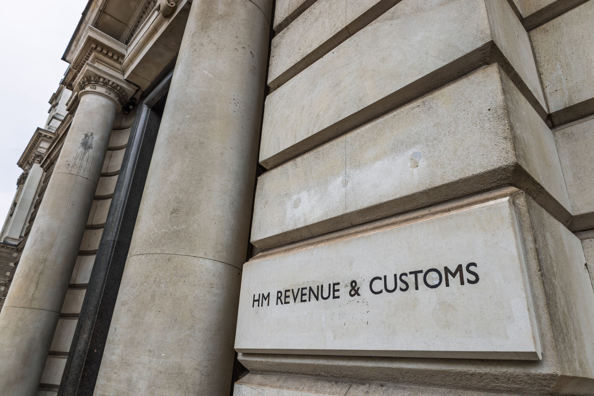 HM Revenue and Customs sign on official government building representing UK tax authority